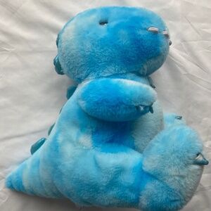 FAO Schwarz Glow Brights plush blue dinosaur lights up & roars